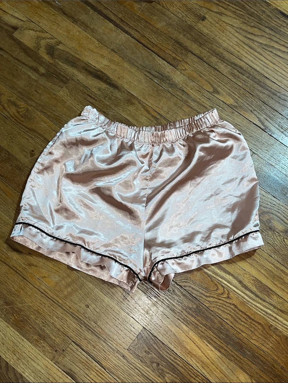 Pink satin boohoo sleep shorts with black piping